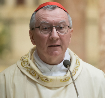 Cardinal Parolin speaking into a microphone